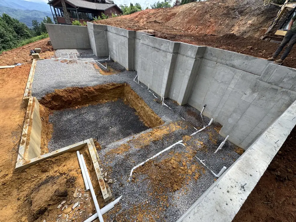 Concrete foundation wall forms and footings on a build site