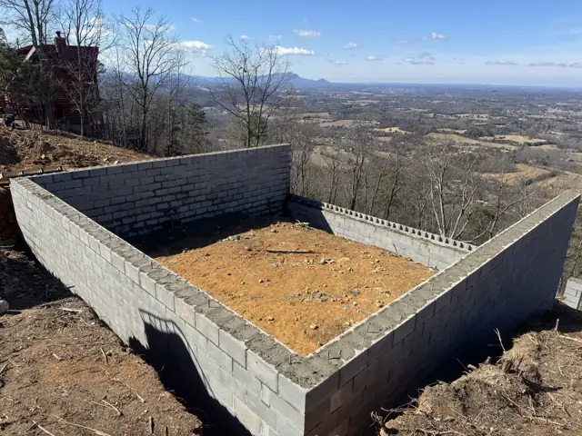 CMU block foundation walls on a hillside lot