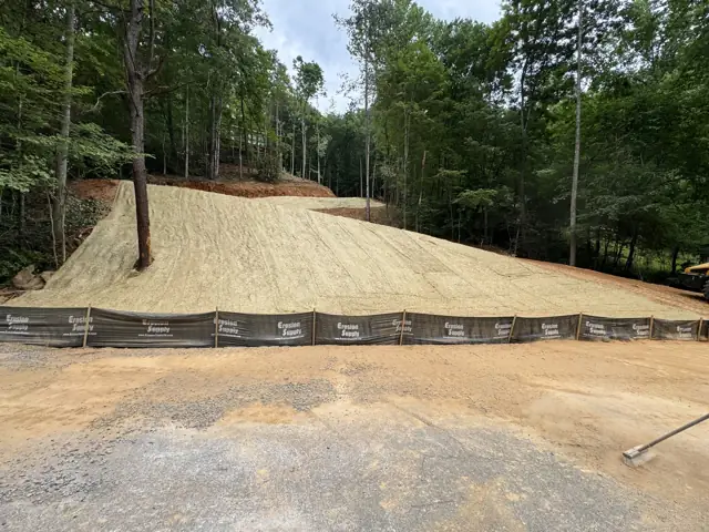 Graded slope with silt fence along the base