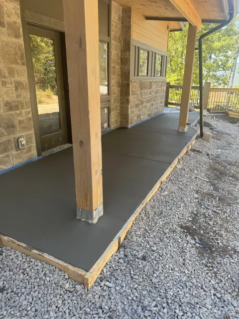Concrete flatwork poured beside a home
