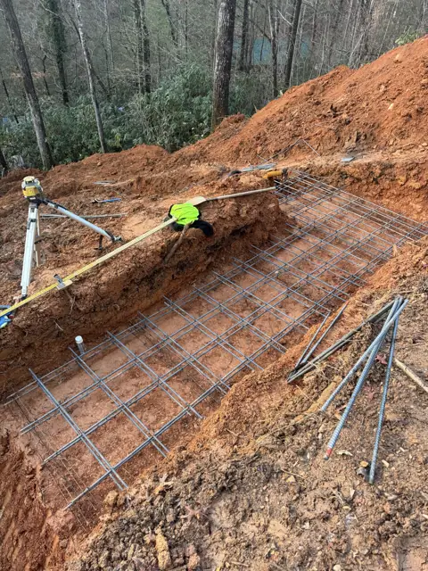 Rebar mat set in a hillside excavation