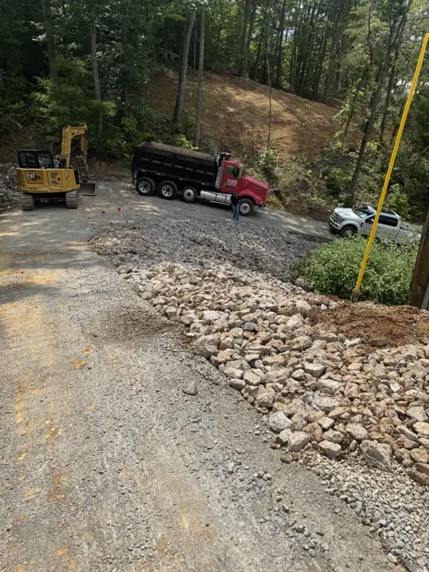 Stone and gravel at a hillside drive