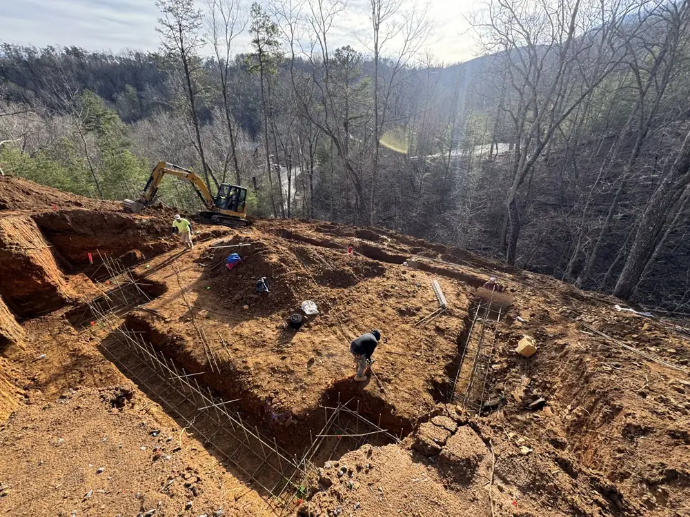 Hillside footing excavation with rebar on a mountain lot near Gatlinburg, TN