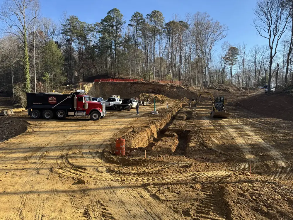Dump truck and dozer grading a large site in Knox County, TN
